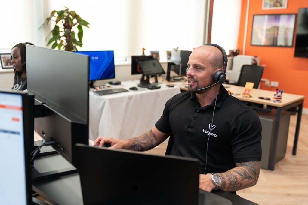 Customer support representative on a headset representing missed-call lead loss