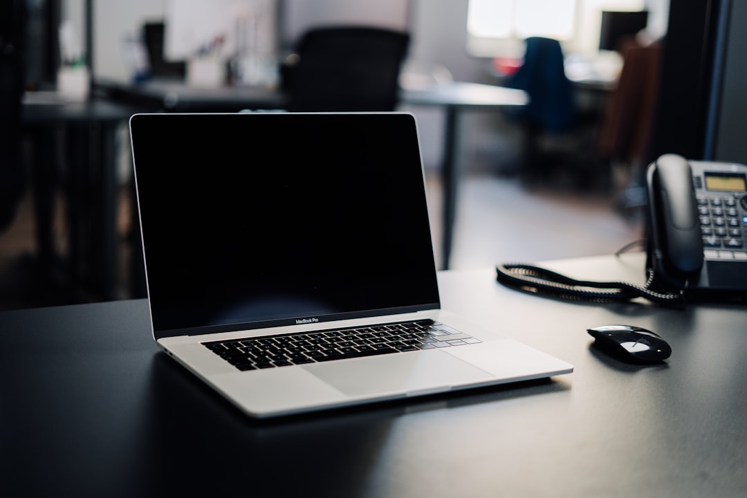 Laptop on a desk representing essential small business website pages