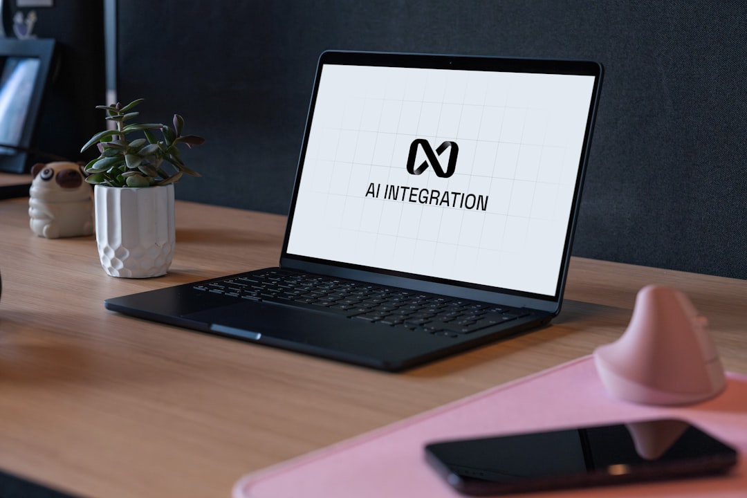 Person using AI software on a laptop representing AI receptionist CRM integration